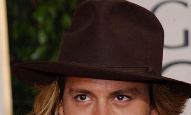 Johnny Depp ‘trying to settle’ lawsuit
